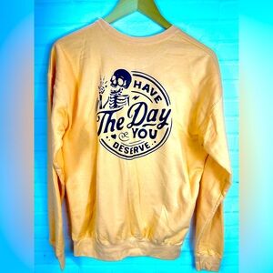 Cantaloupe colored Tultex sweatshirt have the day that you deserve.